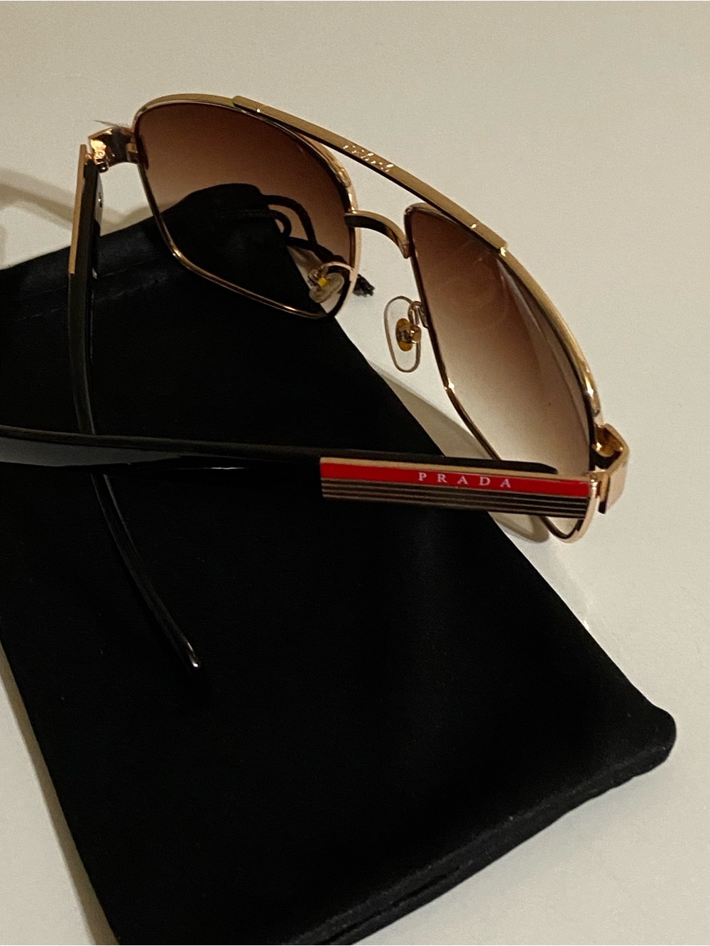 Prada Gold Frame Black Temples Brown Gradient Lens Sunglasses